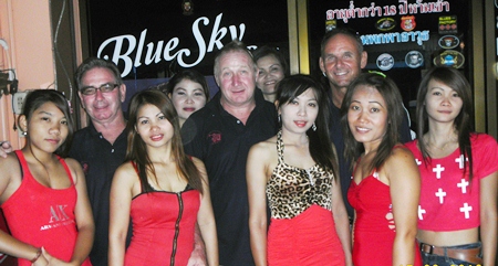 Friday’s top three pose with the staff at Blue Sky Bar.