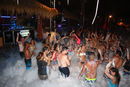 Night party-goers rocking hard at the Hard Rock foam party.