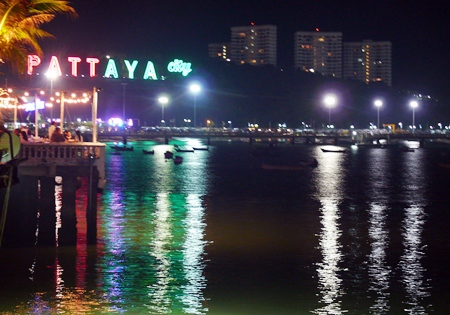 Seated on the deck over the water, cooled by the sea breezes, you can look across Pattaya Bay towards Bali Hai.