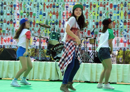 Korean students perform a dance.