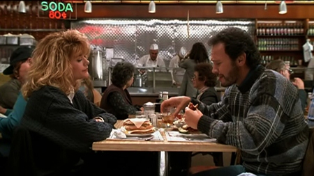 Meg Ryan and Billy Crystal, stars of the 1989 movie “When Harry Met Sally.” This is the famous fake orgasm scene in a New York deli, which culminates with another restaurant patron pointing to Meg and ordering “I’ll have what she’s having.”