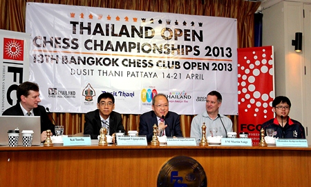 Chatchawal Supachayanont (center), general manager of Dusit Thani Pattaya, gestures as he welcomes the chess players, officials and sponsors of the Thailand Open Chess Championships during the press conference in Bangkok to launch the 13th Bangkok Chess Club Open.