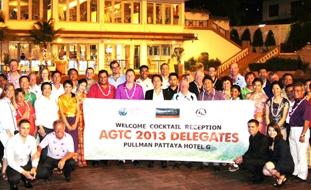 Sophon Vongchatchainont (centre), GM of Pullman Pattaya Hotel G, hosted a welcome cocktail reception for over 50 respected golf tour operators from 29 countries who were in Pattaya to attend the 2nd Asia Golf Tourism Convention (AGTC) in Pattaya city recently. Amongst the dignitaries were Peter Walton (1st row, pink shirt), President & CEO of IAGTO - The Global Golf Tourism Organization; Callum Mackie (1st row, 6th from right), MD of Solar Tours (Thailand) and Tanes Petsuwan (1st row, 5th from right), Tourism Authority of Thailand (TAT) Director of Europe, Africa and the Middle East.