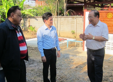 PDG Preecha Jadsri (right) updates PDG Peter and DG Aurak on the progress of the water project.