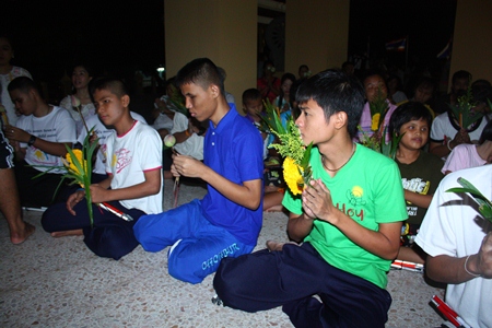 Children from the Redemptorist School for the Blind chant their flowers presentation words before the Wien Thien ceremony.