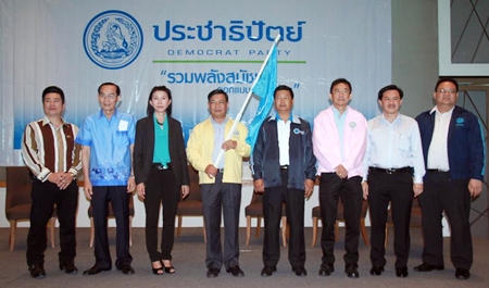 Local Democrat party leaders, led by central region party boss Alongkorn Pholbut (center, with flag), host a public meeting at the Cape Dara Hotel.