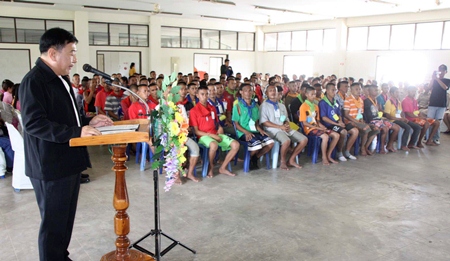 Deputy Gov. Adisak Thepass presides over the graduation ceremony for inmates at the 10-day “behavior modification camp” run by the Royal Thai Navy.