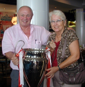 New member Peter Banner, the ‘Happy Auctioneer’ and member Donna Westendorf pose with a replica of the European Champions Cup, supporting the upcoming Golf Day & Dinners on the 7th and 9th of June, and the Gala Dinners on the 6th & 8th of June. For more information, contact events@legacyoflegends.org.