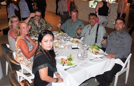 Invited guests and management enjoy the great opening day spread.