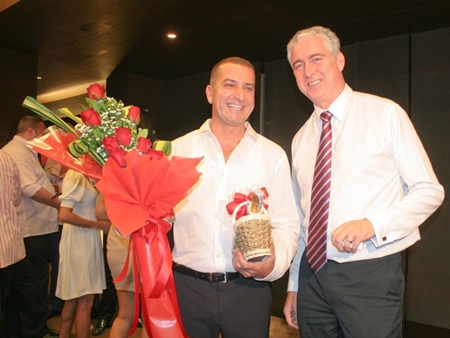 Brendan Daly, general manager of Amari Orchid Pattaya congratulates Miki on his 50th.