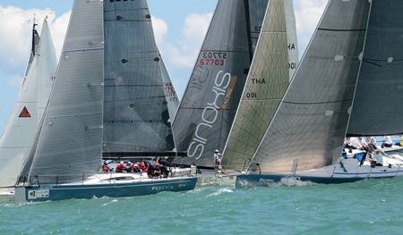 ‘Foxy Lady’ leads the IRC-1 fleet over the start line.