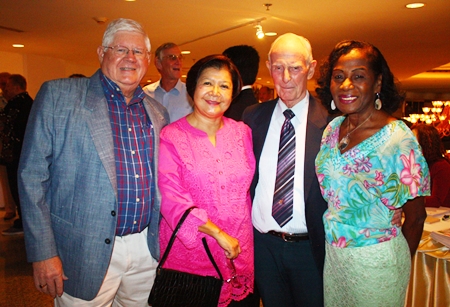 (L to R) David and Siriwan Anderson happily meet up with good friends Richard and Janet Smith.