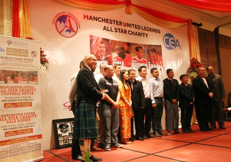 The Manchester United players on stage with sponsors and organizers during the Myanmar leg of their trip where over 30,000 US dollars were raised for charity.