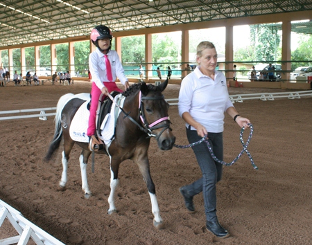 During the Walk Tests, the rider maybe led, and have a side walker.