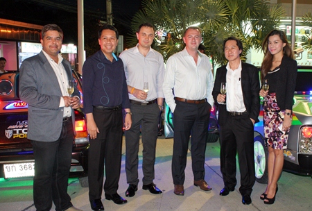 (From left) Suwanthep Malhotra (Asst. MD Pattaya Mail), Sompat Jantawan (GM of Tsix5 Hotel), Dimitri Chernyshev (Exec. Asst. Manager Pullman Pattaya Hotel G), Garth Solly (GM Holiday Inn Pattaya), and Sophon Vongchatchainont (GM Pullman Pattaya Hotel G) share the spotlight with the tricked out cars in the background.