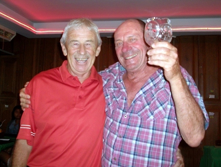 Terry Mangan (left) congratulates golfer of the month JJ Mafray.