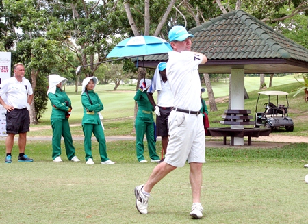 Dennis Irwin tees off on the 11th hole.