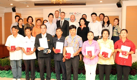 (On stage) Royal Cliff Hotels Group management and executive team awards (front row) 7 recipients of the Long Service and 1 recipient of the Star CARE Certificate.