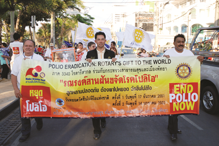 2009 - (L to R) PDG Prempreecha Dibbayawan, Mayor Itthipol Khunplome, and District Governor of Rotary International District 3340 Pratheep Malhotra lead a procession along Beach Road to spread the “End Polio Now” message.