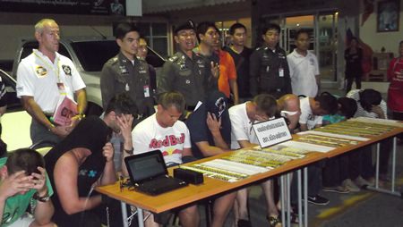Police have arrested a gang of 10 Thai and foreign men suspected of looting more than 20 million baht from local ATMs.