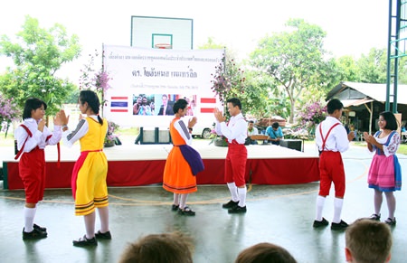 The children thank the ambassador and his family by performing a dance featuring Austrian costumes.