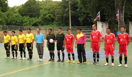 Navy teams line up for a football match as part of the 2-week sports competition at Sattahip Naval Base.