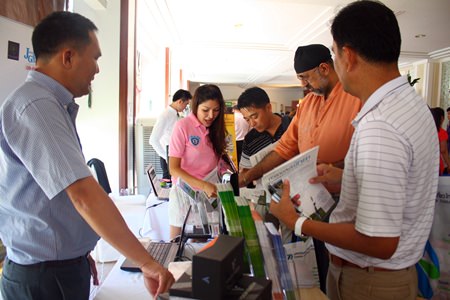 Pattaya’s tourism professionals browse the new technology on display.