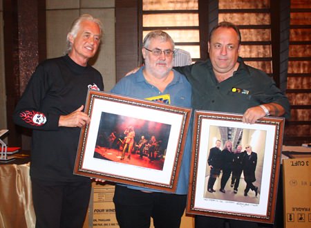 (L to R) Jimmy Page with Phil Chester & Terry Hermansen and their winning items.