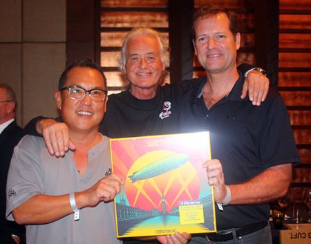 (L to R) John Bahng, Jimmy Page and Roger Cross with his signed Led Zeppelin Celebration Day vinyl box set.