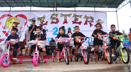 The Fountain of Life ‘best of class’ children receive their bicycles.