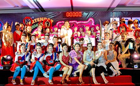 Participants from the 10 teams in ‘Miss Pattaya Bartender’ event pose on stage with Pattaya city mayor, Ittipol Kunplome.