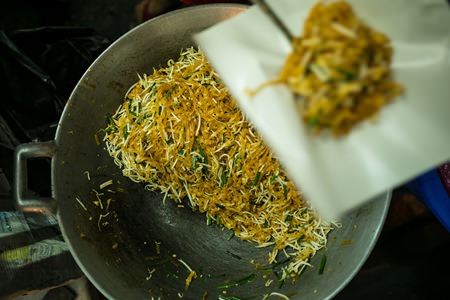 A pushcart stall serves up the popular dish of Pad Thai.