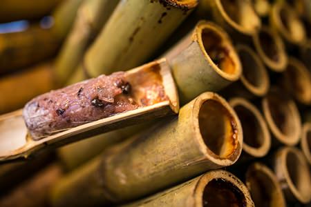Khao Lam, a dessert made of sweet sticky rice stuffed in bamboo.