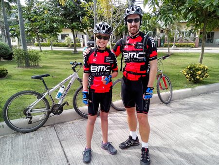 Poppy and her father Nathaniel Mulford, who, with a few other brave teachers from her school, plan to make the trip from the temples at Ayutthaya in Thailand to the temples at Angkor Wat in Cambodia.
