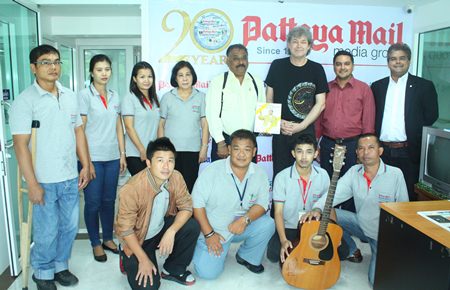 Hucky Eichelmann (standing 3rd right) poses for a photo with Pattaya Mail Media Group management and staff during his courtesy call to the office on Monday, Sept. 16.