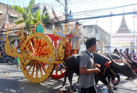 Elaborately ordained carts are eye-catchers in the opening festivities parade.