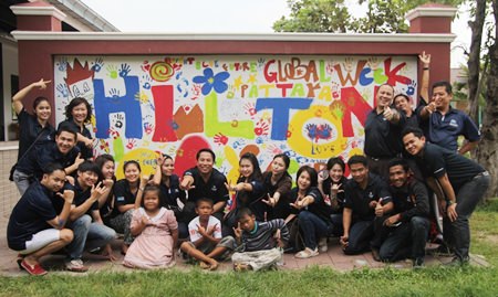 During the afternoon the Hilton Pattaya staff and the children shared some fun, decorating the wall opposite the commemoration plaques with bright colored paint and children’s handprints.