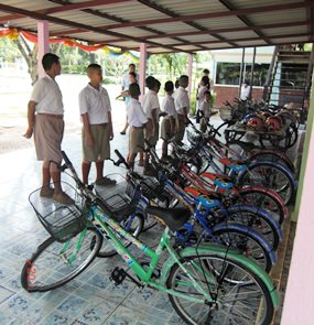 Students line up to try out the new bikes.