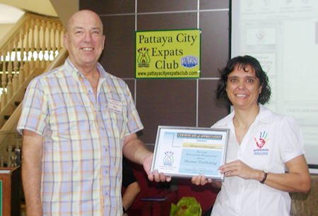 Board member Roy Albiston presents Margie with a Certificate of Appreciation for her thought provoking presentation. More information about the ‘Hand To Hand’ organisation and its work can be found at http://www.handtohandpattaya.com.