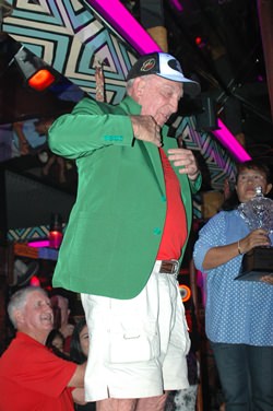 Richard Manthorne dons the champion’s green jacket after being declared the overall winner for 2013.