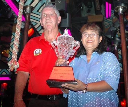 Eric Curley receives his trophy from Mamasan Ead after winning Division B.