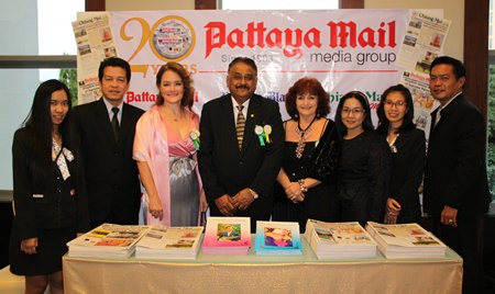 The Pattaya Mail Media Group team stands at our booth awaiting the arrival of the princess. Nopniwat Krailerg (2nd left), Shana Kongmun, Peter Malhotra, Elfi Seitz, Suthasinee Maneekul and Peerasan Wongsri (right) GM Chiang Mai Mail.