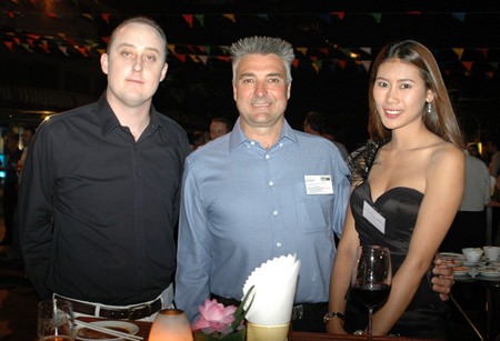 (L to R) Samuel D Kennedy, Executive Director of Emerging Markets Energy, Mark Parkins, Operations Manager for McConnell Dowell Constructors Thai Ltd., and Kantiya Boonruang.