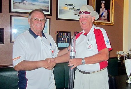 Derek Brook (left) presents the MBMG Group golfer of the month prize to Dick Warberg.