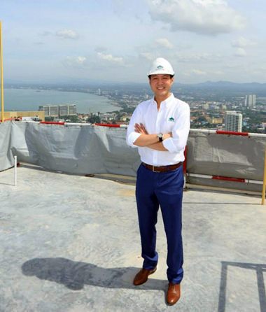 Lionel Lee, Director of Raimon Land, takes in the stunning coastal views from top of Zire’s 54-storey tower.