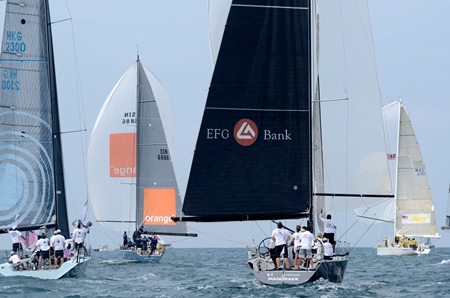 Bill Bremner’s Foxy Lady VI (2nd left) leads the IRC1 fleet downwind.