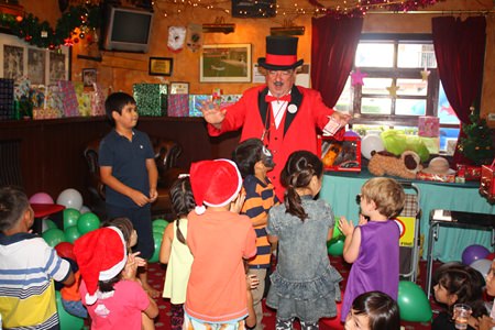 Doc Penguin treats the youngsters to a fun magic show.