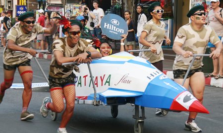 The team from the Hilton flew down Beach Road.