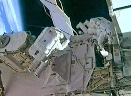 Astronauts Sunita Williams (L) and Michael Lopez-Algeria are shown during a spacewalk on the International Space Station, Jan. 31, 2007.