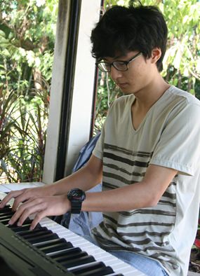 Introducing classical music to the children at the Father Ray Foundation.